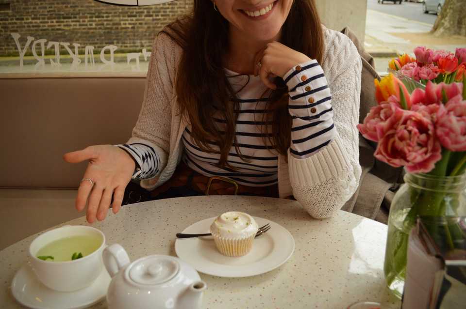 Jude's excited smile and her Key Lime Pie cupcake