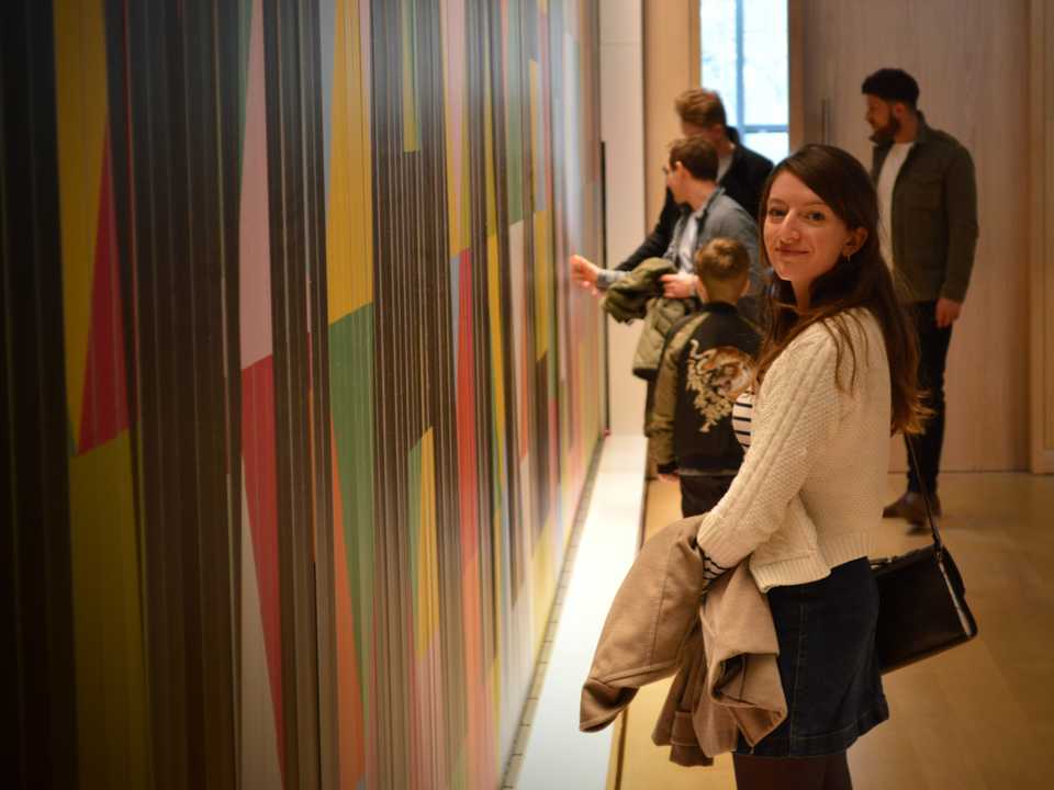 Jude next to the moving signage