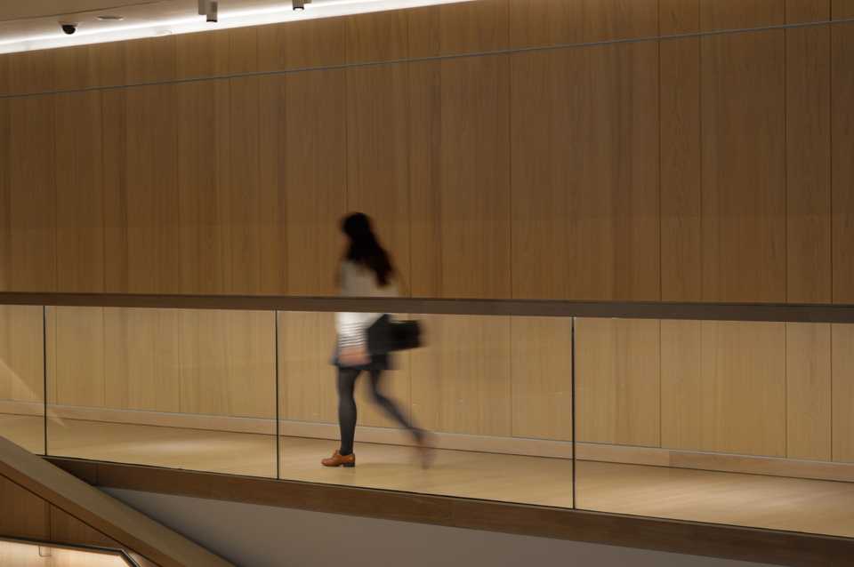 Jude peering over the edge of the balcony