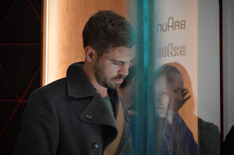Aidan reading the exhibition signs